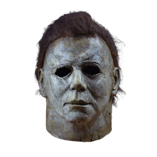Halloween mask with brown hair on a white background