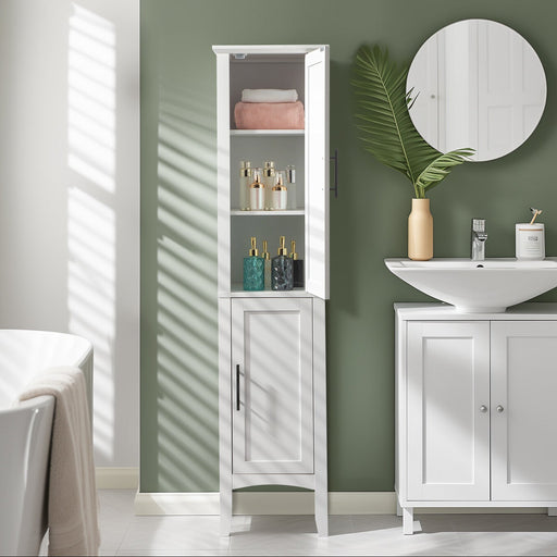 Bathroom with white cabinet, sink, and round mirror against a green wall.