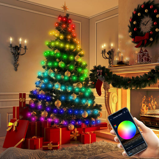 Decorated Christmas tree with colorful lights in a festive living room.