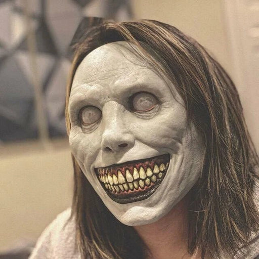 Person wearing Exorcist Halloween mask