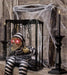 Halloween Animated Screaming Skull Cage Ghost – Motion Sensor Hanging Decoration - Monsta Online